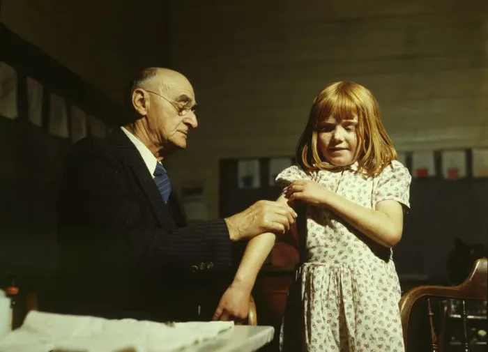Framed Print : Dr. Schreiber of San Augustine giving a typhoid innoculation... San Augustine County, Texas, 1943. Creator: John Vachon Framed Print : Dr. Schreiber of San Augustine giving a typhoid innoculation... San Augustine County, Texas, 1943. Creator: John Vachon