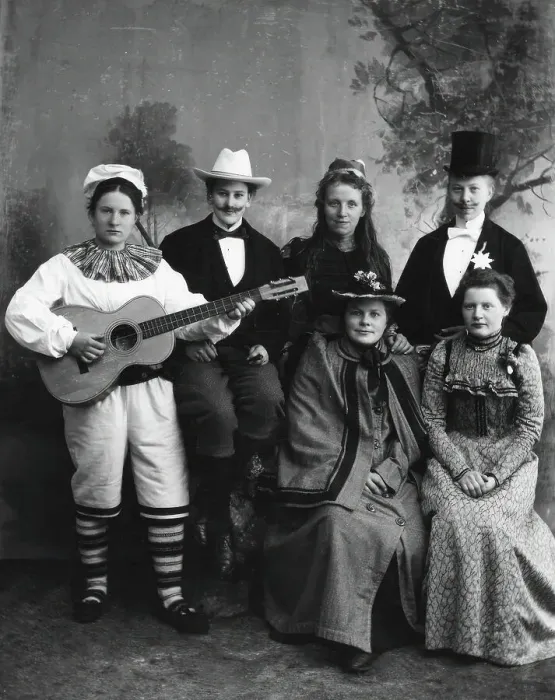 Framed Print : Six dressed-up youngsters, one of the young people plays the guitar, 1910-1920. Creator: Hans Per Persson Framed Print : Six dressed-up youngsters, one of the young people plays the guitar, 1910-1920. Creator: Hans Per Persson
