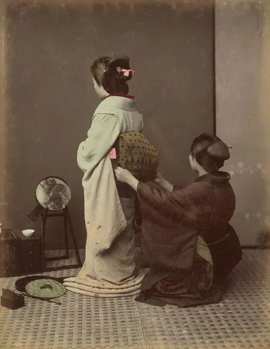 Framed Print : Dressing Obi, 1870s-1890s. Creator: Kusakabe Kimbei Framed Print : Dressing Obi, 1870s-1890s. Creator: Kusakabe Kimbei