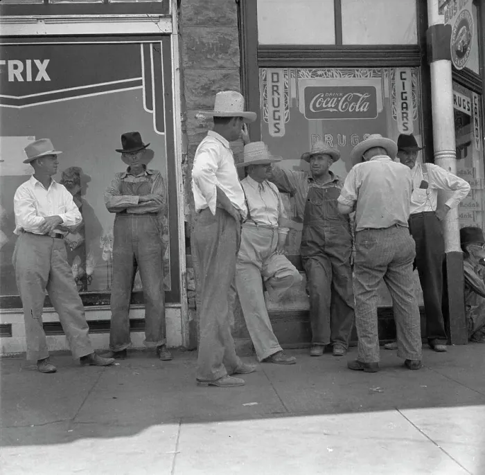 Framed Print : Drought farmers line the shady side of the main street of the town, Sallisaw, Oklahoma, 1936. Creator: Dorothea Lange Framed Print : Drought farmers line the shady side of the main street of the town, Sallisaw, Oklahoma, 1936. Creator: Dorothea Lange