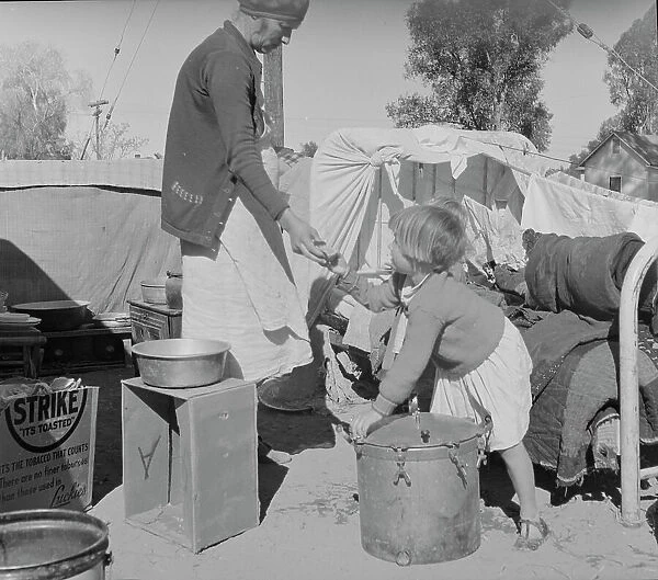 Drought refugees in migratory agricultural workers camp, California, 1937. Creator: Dorothea Lange