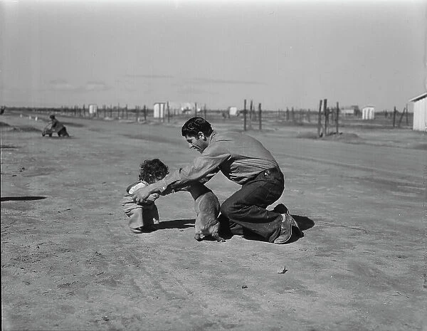 Drought refugees - penniless Oklahomans camped along highway, California, 1936. Creator: Dorothea Lange