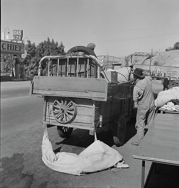 Drought refugees stopped at inspection station on the California-Arizona state line, 1937. Creator: Dorothea Lange