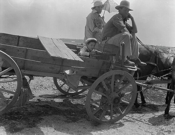 Drought-stricken farmer and family near Muskogee, Oklahoma, 1936. Creator: Dorothea Lange