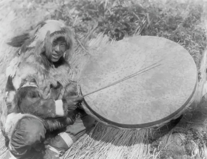 Framed Print : The drummer-Nunivak, c1929. Creator: Edward Sheriff Curtis Framed Print : The drummer-Nunivak, c1929. Creator: Edward Sheriff Curtis