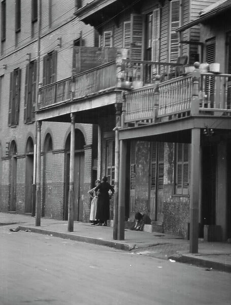 Dumaine Street, New Orleans, between 1920 and 1926. Creator: Arnold Genthe