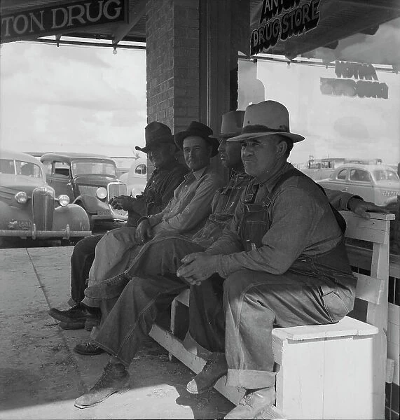 Dust bowl farmers of west Texas in town, 1937. Creator: Dorothea Lange