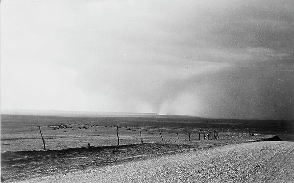 Dust storm near Mills, New Mexico, 1935. Creator: Dorothea Lange