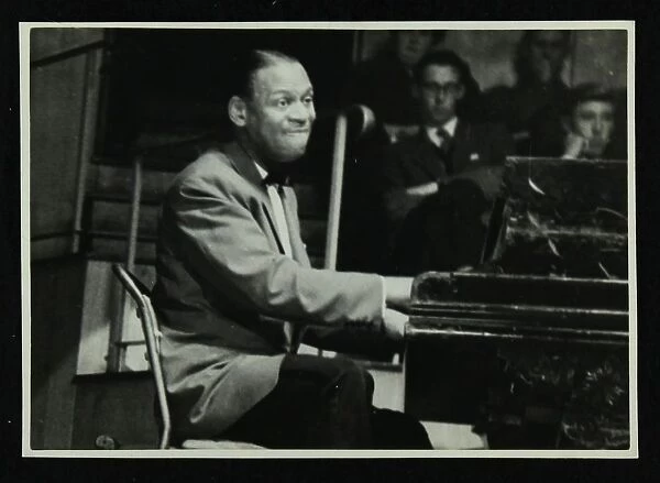 Earl Fatha Hines at the piano, 1950s. Artist: Denis Williams