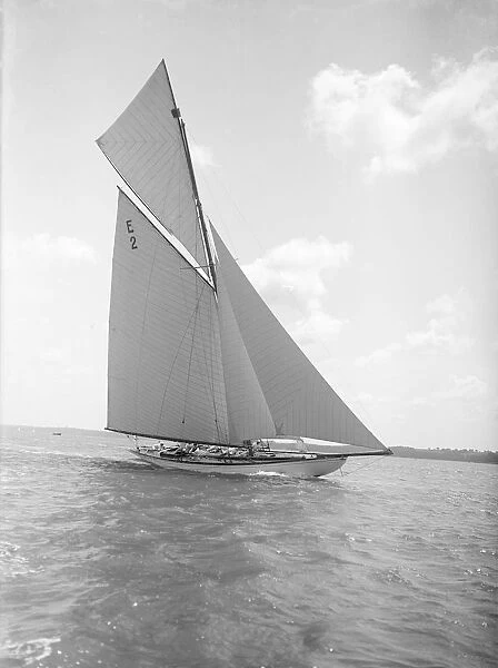 The early 12 Metre cutter Cintra sailing close-hauled, 1911. Creator: Kirk & Sons of Cowes
