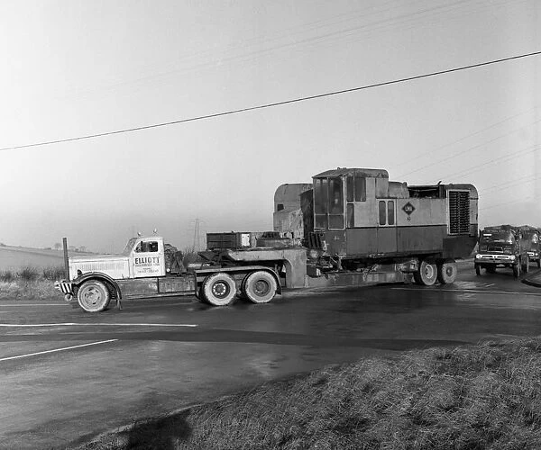 Early 1940s Diamond T truck pulling a large load, South Yorkshire, 1962