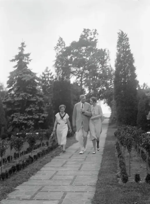 Framed Print : Edge, Charles N. walking with Margaret Edge and another woman in his garden, 1932 or 1933. Creator: Arnold Genthe Framed Print : Edge, Charles N. walking with Margaret Edge and another woman in his garden, 1932 or 1933. Creator: Arnold Genthe