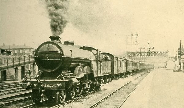 Edinburgh-London Express Leaving York, London and North Eastern Railway, 1930. Creator: H