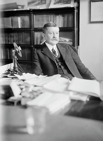 Edward B. Moore, Commissioner of Patents - At Desk, 1912. Creator: Harris & Ewing. Edward B. Moore, Commissioner of Patents - At Desk, 1912. Creator: Harris & Ewing