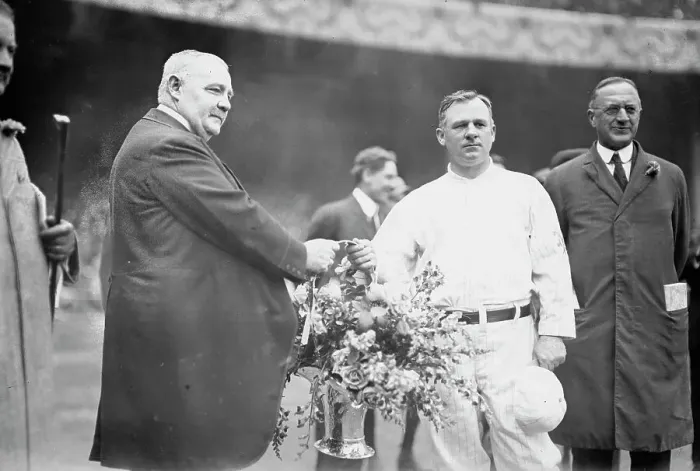 Framed Print : Edward McCall presents a silver basket of flowers to New York Giants manager John McGraw... 1913. Creator: Bain News Service Framed Print : Edward McCall presents a silver basket of flowers to New York Giants manager John McGraw... 1913. Creator: Bain News Service