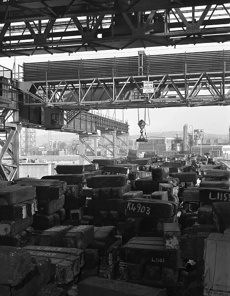 Eectromagnet above steel ingots, Park Gate Iron & Steel Co, Rotherham, South Yorkshire, 1964