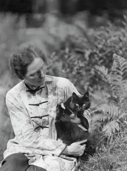 Framed Print : Egger, Gabrielle, Miss, friend of, with cat, seated outdoors, between 1926 and 1930. Creator: Arnold Genthe Framed Print : Egger, Gabrielle, Miss, friend of, with cat, seated outdoors, between 1926 and 1930. Creator: Arnold Genthe