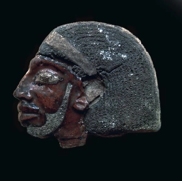 Egyptian glazed relief of a Nubian slave