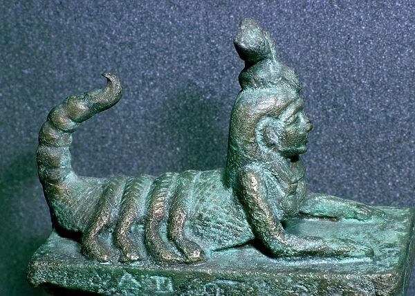 Egyptian lid of a bronze receptacle for a dead scorpion