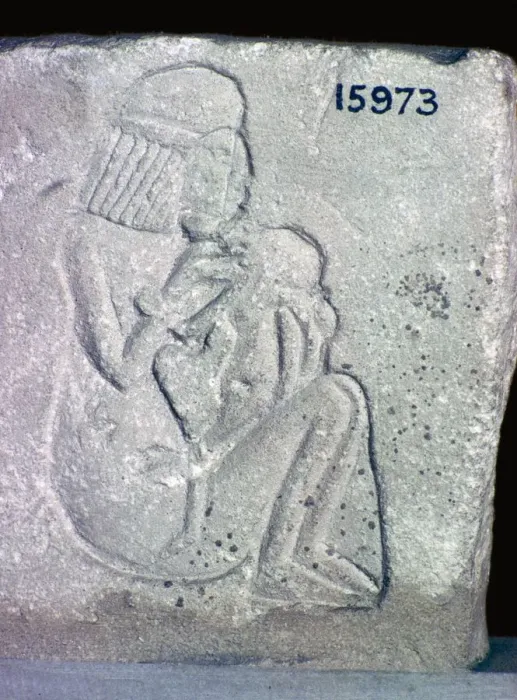 Framed Print : Egyptian relief of a woman suckling a child, 14th century BC Framed Print : Egyptian relief of a woman suckling a child, 14th century BC