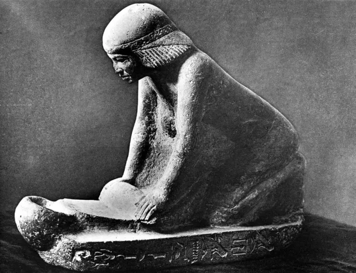 Framed Print : Egyptian tomb figure of a woman grinding corn using a saddle quern, c2500 BC Framed Print : Egyptian tomb figure of a woman grinding corn using a saddle quern, c2500 BC