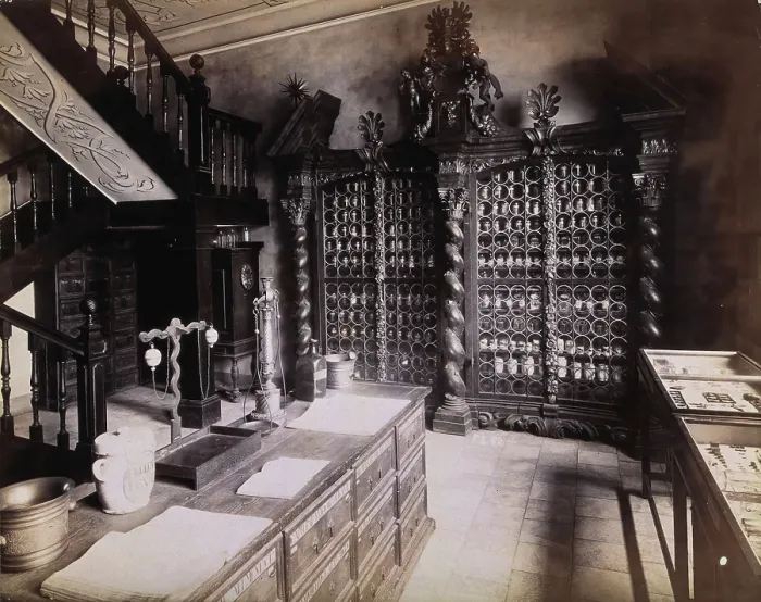 Framed Print : An eighteenth-century apothecary's shop with intricately carved wooden showcases; recreated Framed Print : An eighteenth-century apothecary's shop with intricately carved wooden showcases; recreated