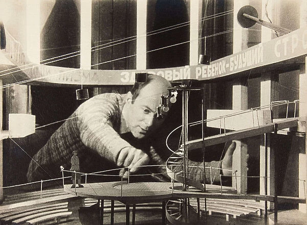 El Lissitzky Working on a Stage Design, Meyerhold Theatre, 1929. Creator: Anonymous