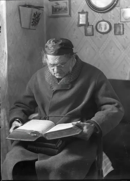 Framed Print : An elderly man sits and reads a book, 1880-1910. Creator: Johan Severin Nilson Framed Print : An elderly man sits and reads a book, 1880-1910. Creator: Johan Severin Nilson