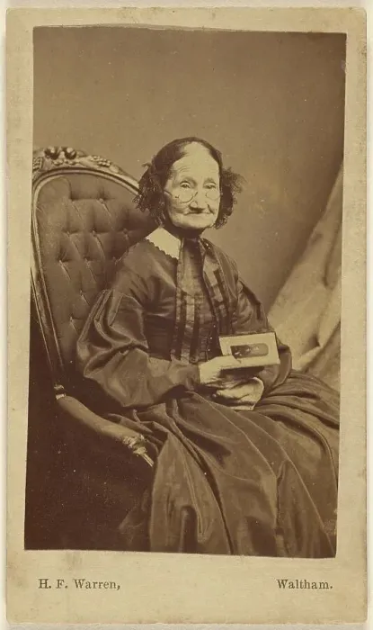 Framed Print : Elderly woman holding a photograph, about 1865. Creator: Henry F Warren Framed Print : Elderly woman holding a photograph, about 1865. Creator: Henry F Warren