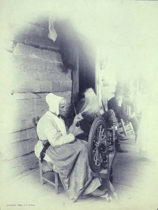 Framed Print : Elderly woman sitting on porch spinning, c1894. Creator: Charles Richards Dodge Framed Print : Elderly woman sitting on porch spinning, c1894. Creator: Charles Richards Dodge