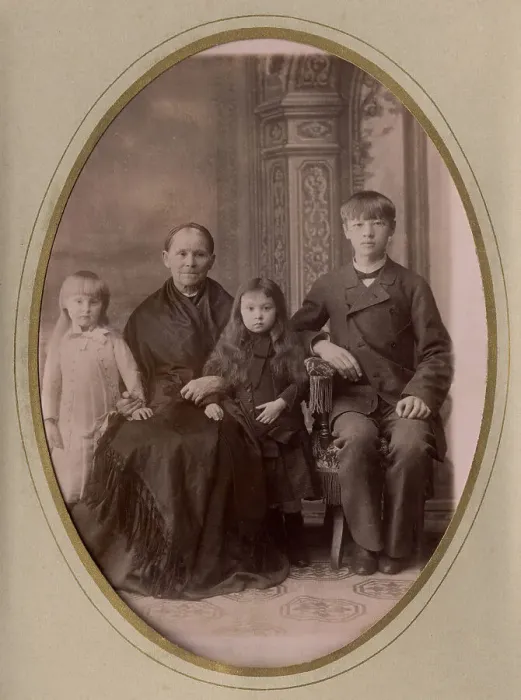 Framed Print : An elderly woman, a young man in a civilian suit and two. late 19th cent - early 20th cent. Creator: PA Milevskii Framed Print : An elderly woman, a young man in a civilian suit and two. late 19th cent - early 20th cent. Creator: PA Milevskii