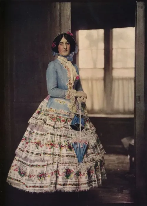 Framed Print : An embroidered coat, with a lovely silk gauze skirt. In fashion between 1850 and 1860, c1913 Framed Print : An embroidered coat, with a lovely silk gauze skirt. In fashion between 1850 and 1860, c1913