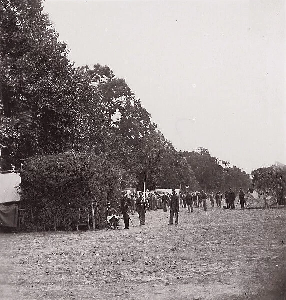 [Encampment alongside a stand of trees]. Brady album, p. 123, 1861-65. Creator: Unknown