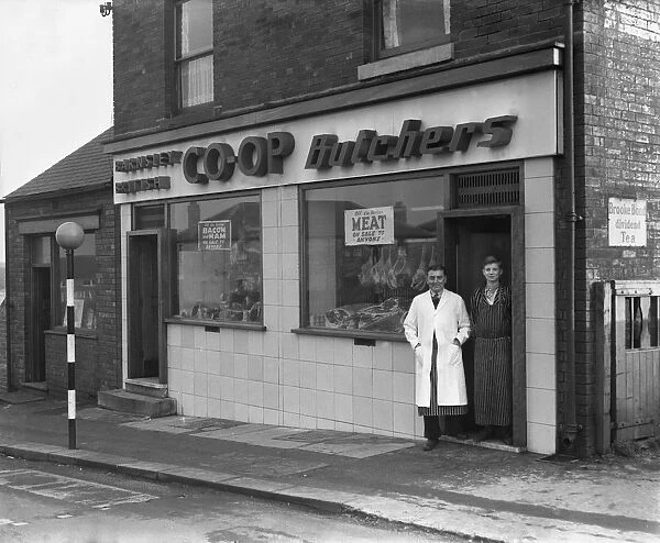End of rationing, meat and bacon on sale at the Barnsley Co-op butchers, South Yorkshire, 1954