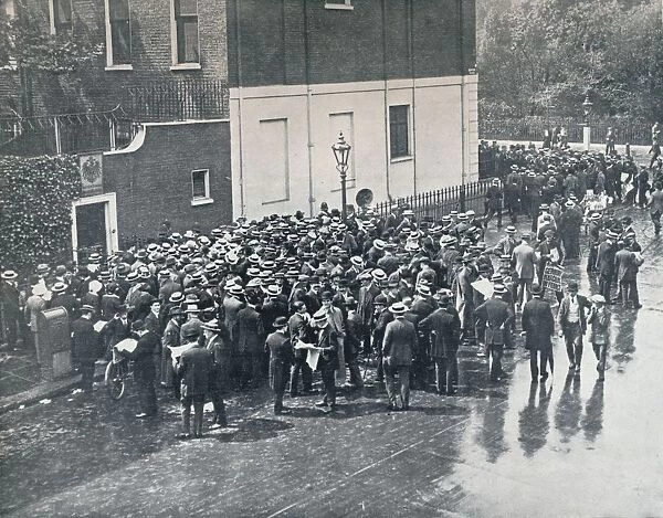 Before England declared war: German Reservists waiting outside German Consulate in London, 1914
