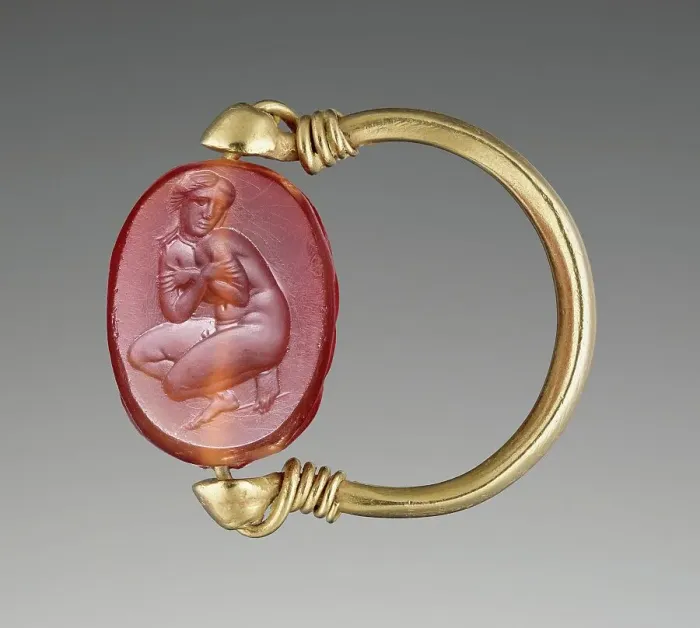 Framed Print : Engraved Scarab with Aphrodite Bathing in a Gold Swivel Ring, about 350 BC. Creator: Unknown Framed Print : Engraved Scarab with Aphrodite Bathing in a Gold Swivel Ring, about 350 BC. Creator: Unknown