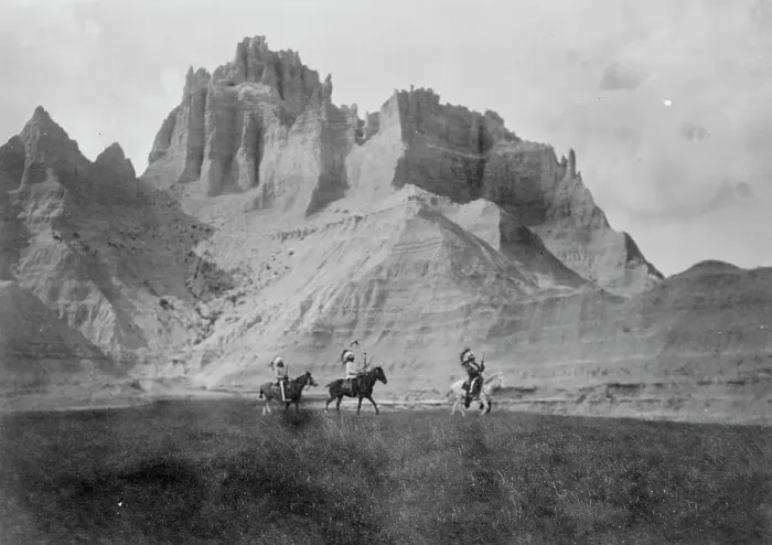 Framed Print : Entering the Bad Lands. Three Sioux Indians on horseback, c1905. Creator: Edward Sheriff Curtis Framed Print : Entering the Bad Lands. Three Sioux Indians on horseback, c1905. Creator: Edward Sheriff Curtis