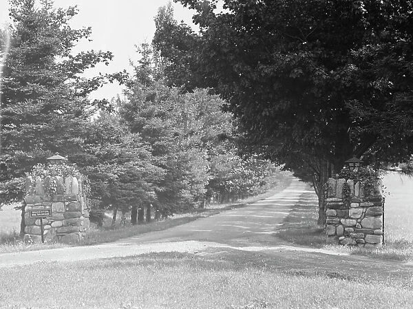 Entrance to the driveway of the Baldrige estate, 1931 July 25. Creator: Arnold Genthe