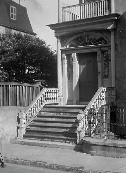 Entrance to a multi-story house, New Orleans or Charleston, South Carolina, between 1920 and 1926. Creator: Arnold Genthe