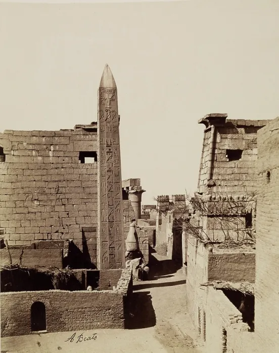 Framed Print : Entrance to Temple of Luxor with Modern Mud-Brick Houses. Luxor, East Bank, between 1860 and 1903. Creator: Antonio Beato