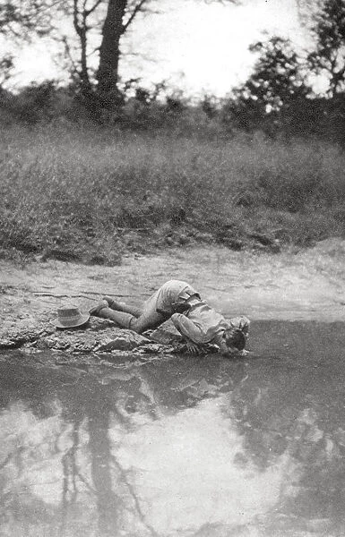 Errol Hinds drinking, Mongalla to Terrakekka, Sudan, 1925 (1927). Artist: Thomas A Glover