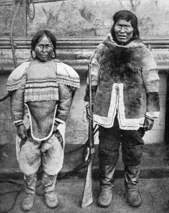 Framed Print : Eskimo hunter and his wife in winter costume, c1922. Artist: Brown Bros Framed Print : Eskimo hunter and his wife in winter costume, c1922. Artist: Brown Bros