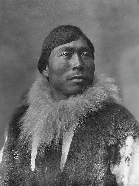 Eskimo posing , c1903, printed (1927?). Creator: Lomen Brothers