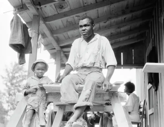 Framed Print : Evicted Arkansas sharecropper, now building his new home at Hill House, Mississippi, 1936. Creator: Dorothea Lange Framed Print : Evicted Arkansas sharecropper, now building his new home at Hill House, Mississippi, 1936. Creator: Dorothea Lange