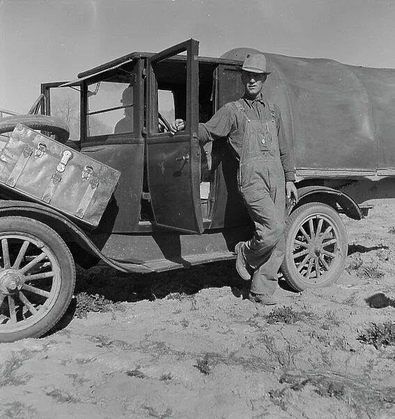 Ex-tenant farmer from Texas, came to work in the fruit... Coachella Valley, California, 1937. Creator: Dorothea Lange