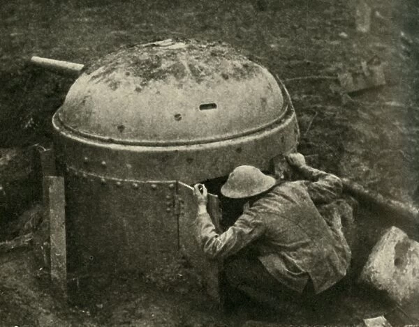Examining a Captured German Anti-tank Gun, First World War, c1917, (c1920). Creator: Unknown