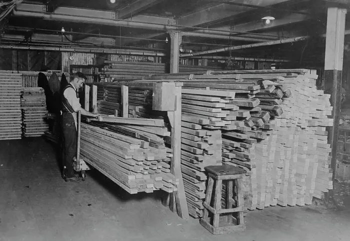 Framed Print : Examining spruce for planes, between c1915 and c1920. Creator: Bain News Service Framed Print : Examining spruce for planes, between c1915 and c1920. Creator: Bain News Service
