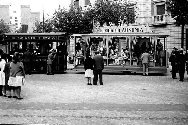 Exhibition of old trams with people in costume in the city center, photo about 1960