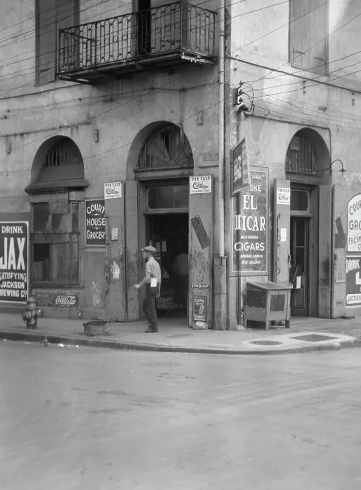 Framed Print : Exterior of Court House Grocer, New Orleans, between 1920 and 1926. Creator: Arnold Genthe Framed Print : Exterior of Court House Grocer, New Orleans, between 1920 and 1926. Creator: Arnold Genthe