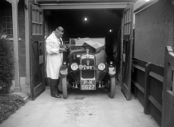 Framed Print : FA Thatcher working on his 1929 Triumph Super Seven. Artist: Bill Brunell Framed Print : FA Thatcher working on his 1929 Triumph Super Seven. Artist: Bill Brunell